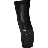 Gros plan sur la coquille souple et le tissu respirant des protège-genoux Fox Enduro Pro noirs, illustrant la protection à l'impact en enduro