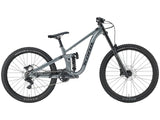 Vélo de montagne enduro Kona Process X vu de profil sur fond neutre en studio, cadre tout-suspendu en aluminium