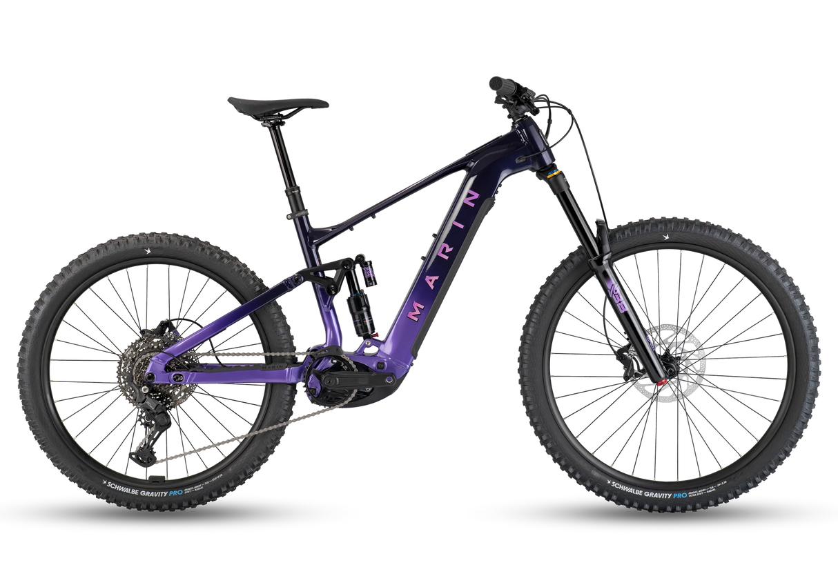 Vélo de montagne électrique Marin Alpine Trail E1 2026 en coloris Purple Fade, vue latérale complète montrant le cadre Series 4 Alloy et les roues mixtes 29 et 27,5 pouces.