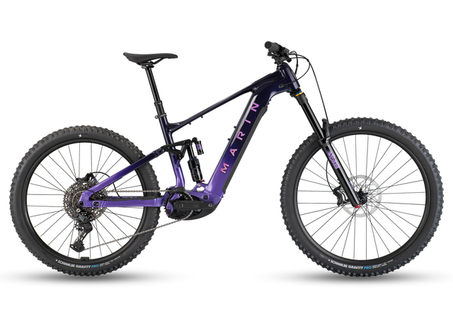 Vélo de montagne électrique Marin Alpine Trail E1 2026 en coloris Purple Fade, vue latérale complète montrant le cadre Series 4 Alloy et les roues mixtes 29 et 27,5 pouces.