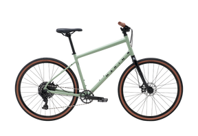 Vélo hybride urbain Marin Kentfield 2, vue latérale complète montrant le cadre Series 1 en aluminium, la fourche en acier Moto Blade et les pneus Vee Tire GPVee 700x40 mm.