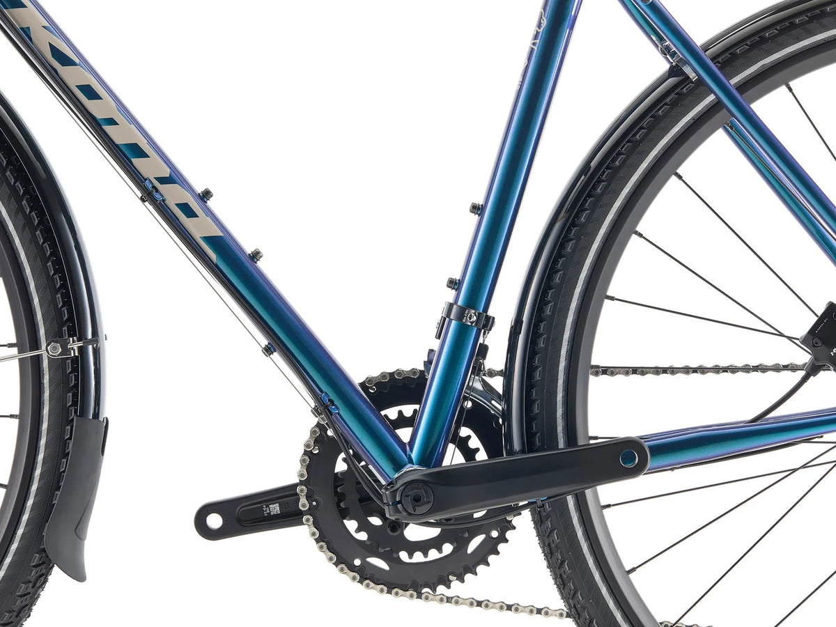 Gros plan du pneu Schwalbe Marathon Mondial 700x40c monté sur jante WTB i25 du Kona Sutra SE 2027, conçu pour rouler loin sur toutes les surfaces.